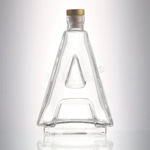 China Custom 500 ml Letter shape liquor glass whisky bottle  Manufacturers, Supplier