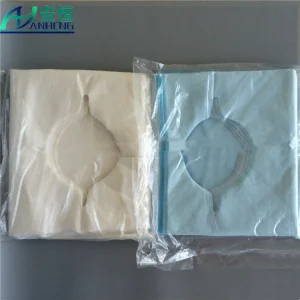 Surgical Drape with Adhesive Hole