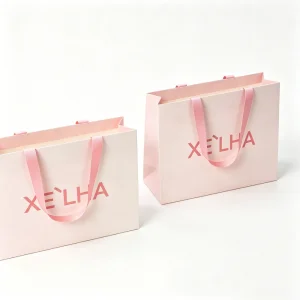 OEM Factory Direct Custom Printed Paper Bag With Colorful Ribbon Handle for Beauty Store Shopping Pink Gift Bag