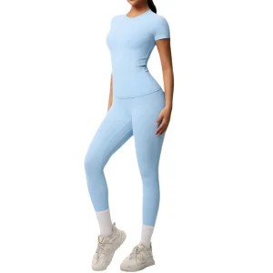 Conjunto de ropa deportiva de pantalones de yoga de color puro de Europa y América, manga larga, amigable con la piel, transpirable, hermosa espalda, camiseta de manga corta, ajustada para el entrenamiento