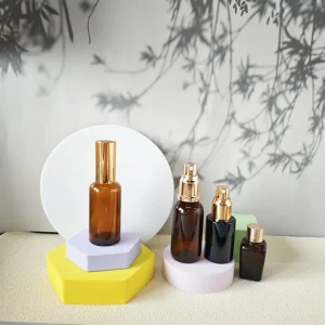 Refillable Portable Cosmetic Packaging 30ml 50ml Amber Essential Oil Glass Bottle with Fine Mist Spray Cream Lotion Pump