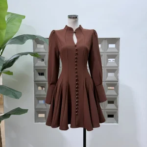 Ropa de boutique primavera nueva elegante falda corta para mujer ajustada de color puro vestido elegante de manga larga