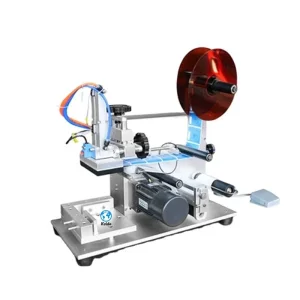 The Automatic Labeling and Coding Machine Is Used to Print the Date of the Label Sticker of the square Bottle with Flat Edge