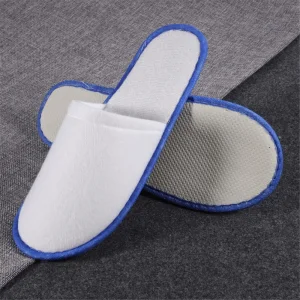 Zapatilla desechable con franja azul