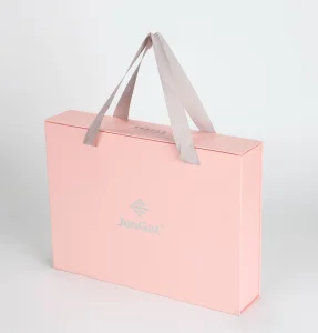 China Wholesales Pink Paper Gift Packaging Bag with Ribbon Handle Cosmetic Tea Wine Bag