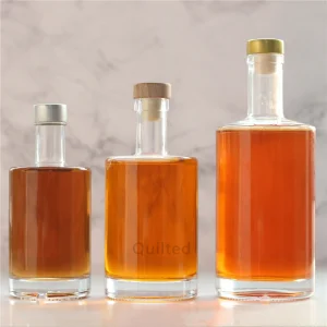 Wholesale 500 ml clear round liquor glass bottle