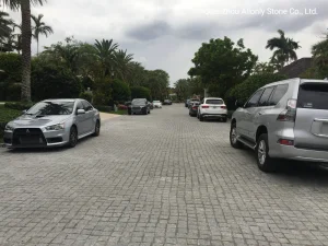 China Wholesale Cheap Natural Split Tumbledg603 Light Grey Granite Cobblestone Driveway Pavers Price