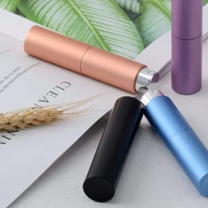 Wholesale Hot Sale 8ml 10ml Twist up Mini Portable Refillable Travel Size Colorful Aluminum Plastic Shell Sprayer Perfume Bottle