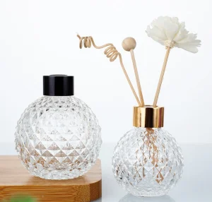 Wholesale 100ml Transparent Spherical Embossed Car Aroma Diffuser Home Decoration Crystal Glass Bottle