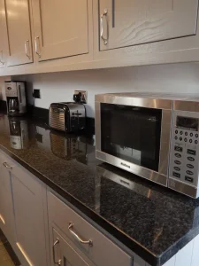 Prefabricated Stone Countertop and Tile India Black Pearl Granite Kitchen