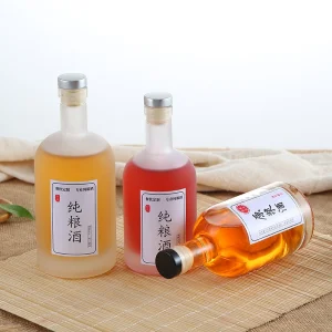 Round Embossed Logo Glass Bottle