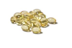 Suplementos naturales para el crecimiento del cabello vitamina E en cápsulas blandas
