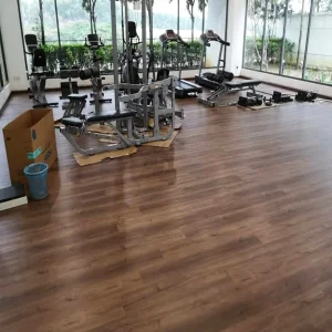 High Quality New Material PVC WPC Vinyl Plank 5mm 6mm Waterproof Fire-Resistant Spc Floor Non-Slip Anti-Scratch Spc Flooring for Bathroom with ISO