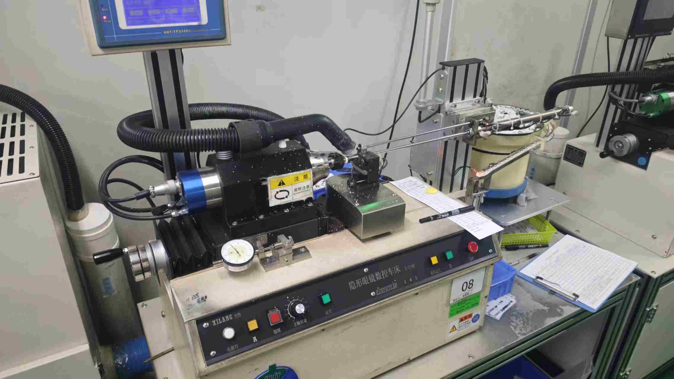 Advanced cutting machine at Dailylensie contact lens factory