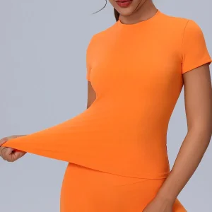 Camiseta deportiva ajustada de manga corta para mujer, de cuello redondo, alta elasticidad y transpirable