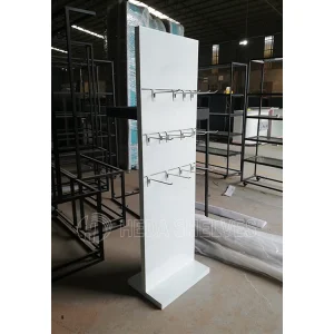Customized White Display Rack with Slatwall Hooks - Seattle Edition
