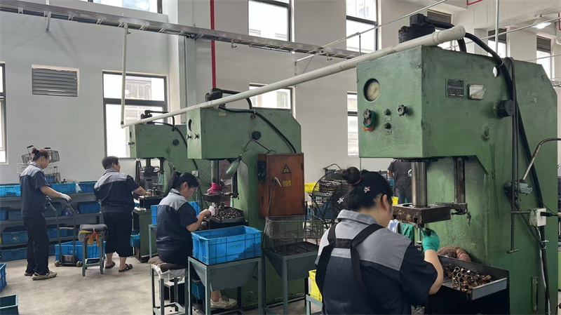 Hydraulic punching machine creating precise holes in filter press plates