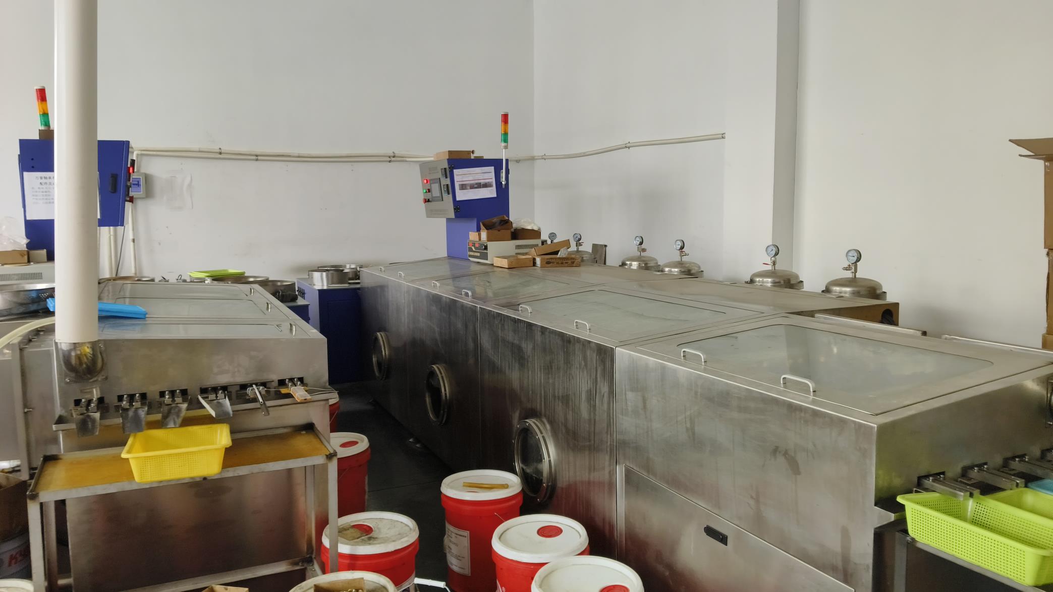 Industrial cleaning machine for contamination control during micro motor production