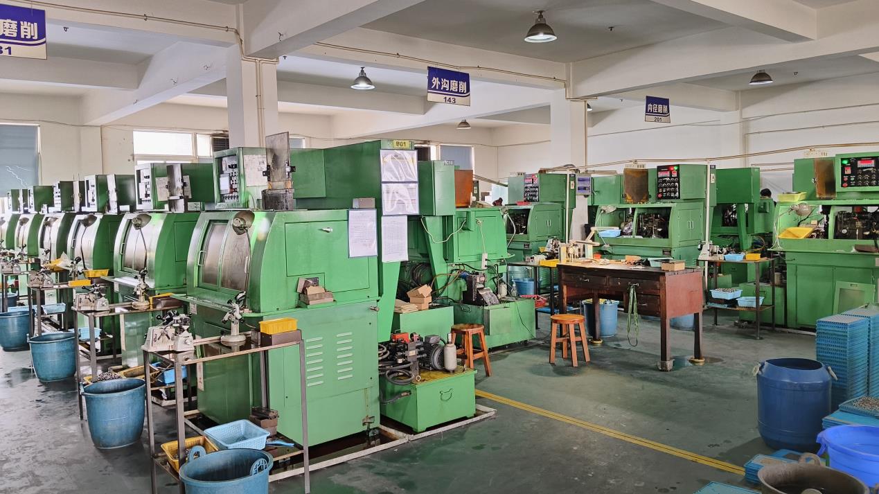 Grinding machine used for precision machining of micro motor components at AAGE