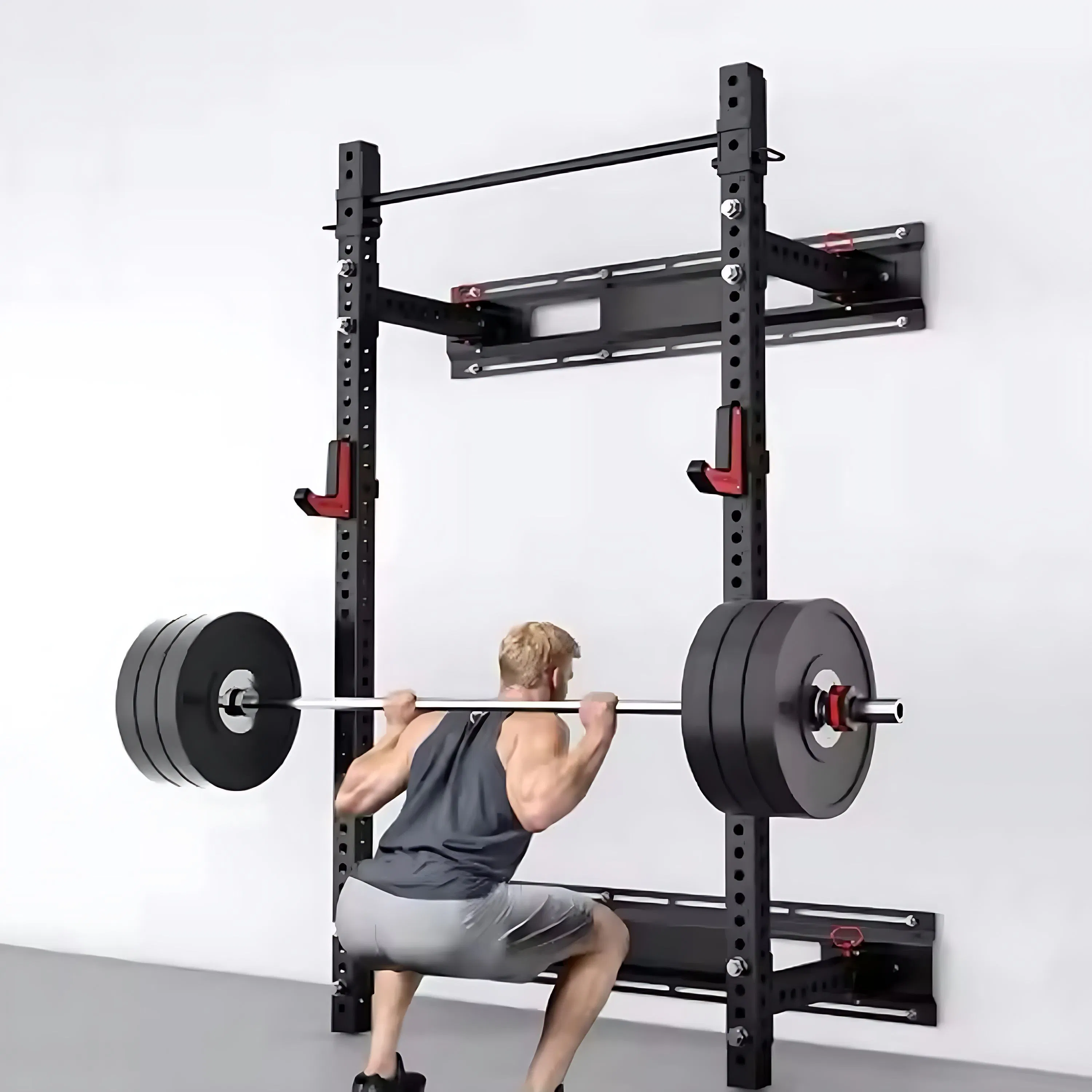 Soporte de sentadillas plegable montado en la pared versátil para sistemas de entrenamiento de fuerza profesional