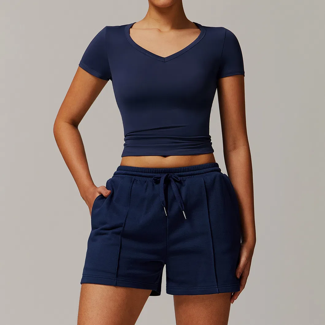 Calças curtas esportivas de cintura alta, camisa de roupas esportivas para o traje casual feminino durante o treino