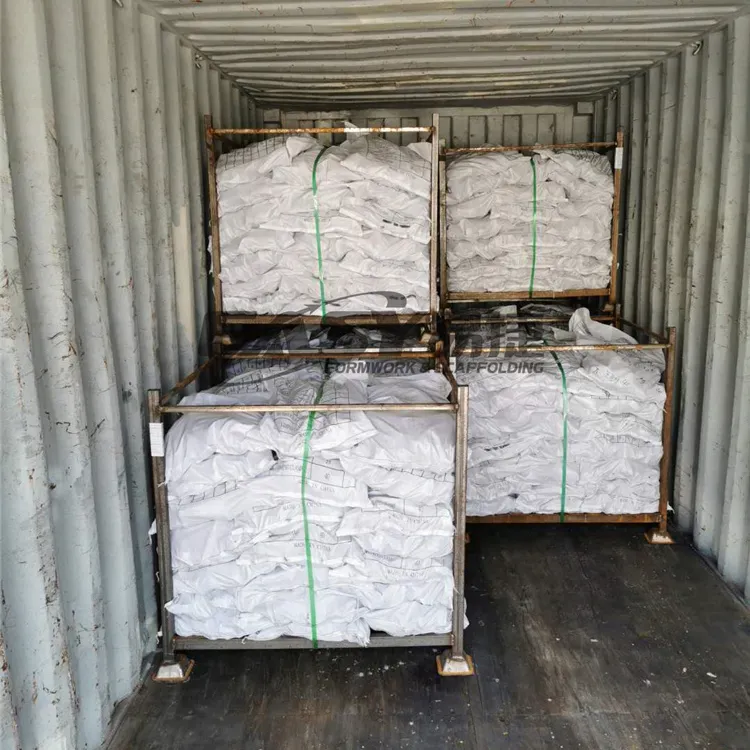 Bags of scaffold clamps organized on pallet