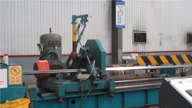 Precision cutting of scaffolding fastener components to exact specifications