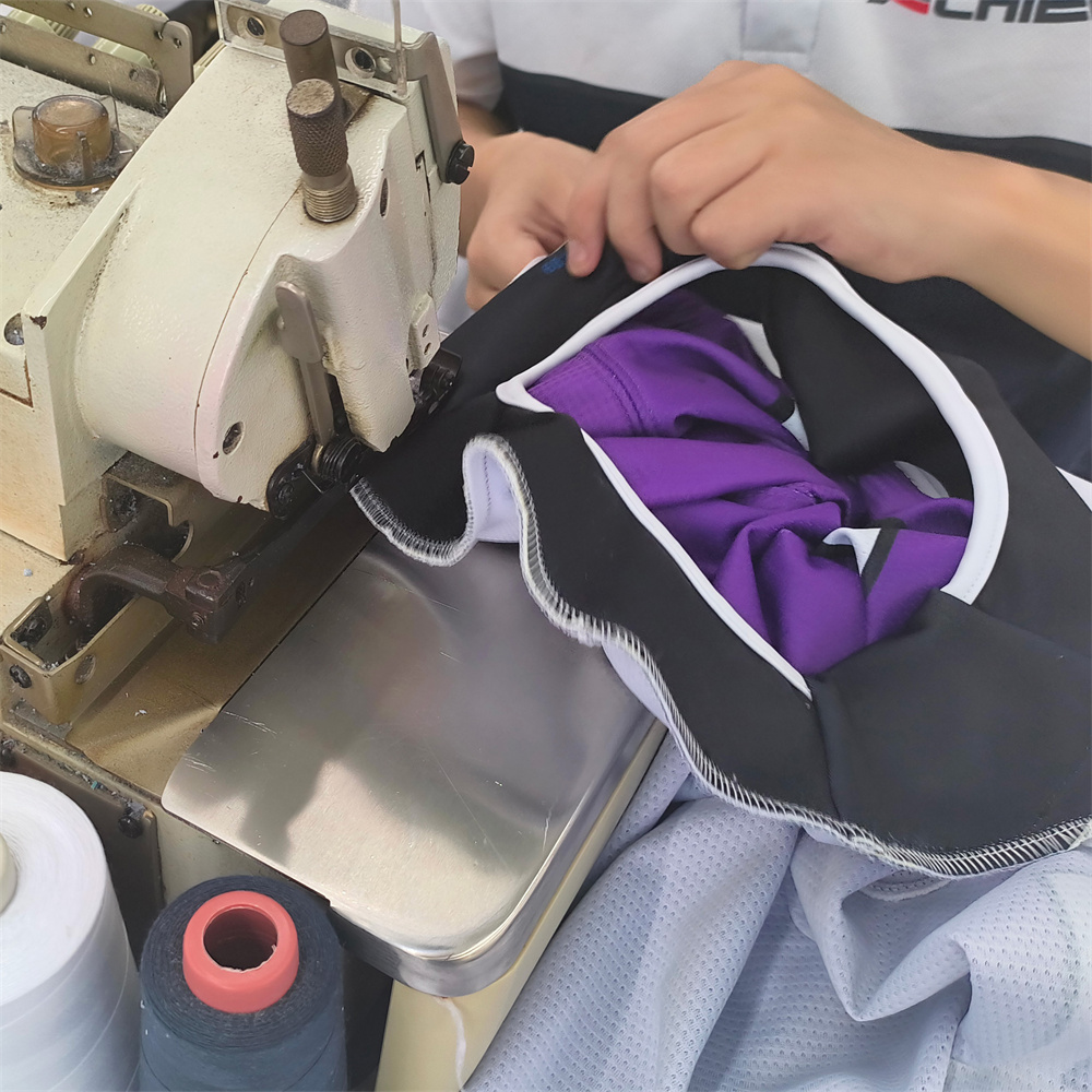 Seam stitching and edge stitching machine for sportswear assembly