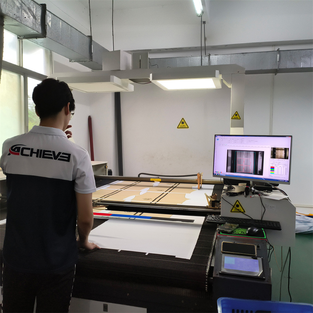 Laser cutting machine 2 at Achieve Sportswear production facility