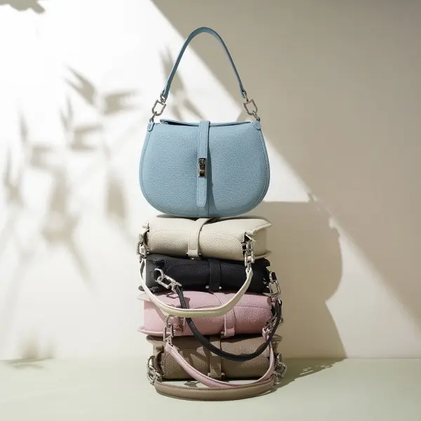 China Custom Logo Hot Sale Durable Waterproof Zipper Stylish Genuine Leather Women's Shoulder Strap Handbag Polyester Lining 1-1.9L Manufacturers, Supplier