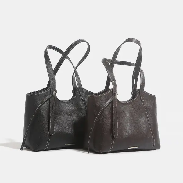 China Hot Sale Women's Luxury Genuine Leather Waterproof Foldable Handbag for Daily Business Travel Use Manufacturer, Supplier