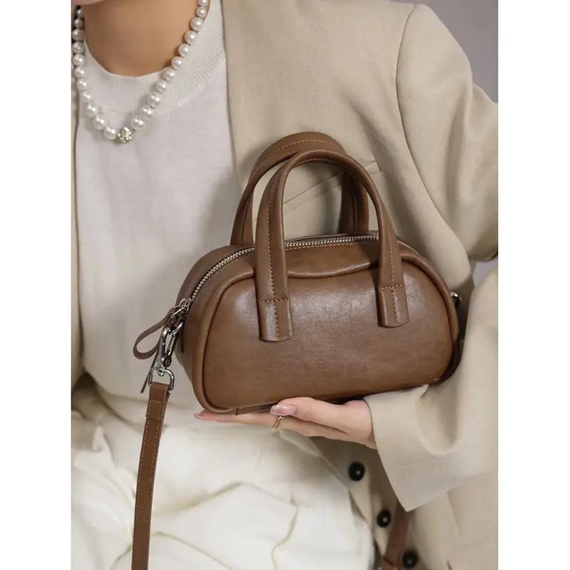 Wholesale Cowhide Boston Bag Handheld Shoulder Messenger Bag Bowling Bag Manufacturers, Supplier
