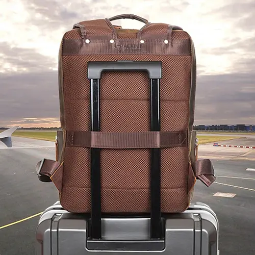 Shoulder strap storage and travel drawbar pocket design