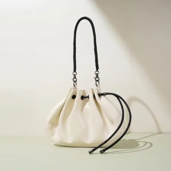 China Niche Design Premium Pleated Handbag, Drawstring Lucky Bag, Summer Mini Crossbody Bag for Women Manufacturers, Factories