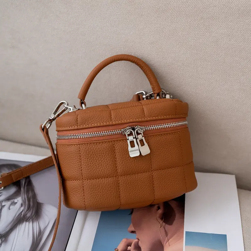 China Top Layer Cowhide Women's Cosmetic Bag Cowhide Handbag Messenger Bag Box Bag Manufacturer, Manufacturers