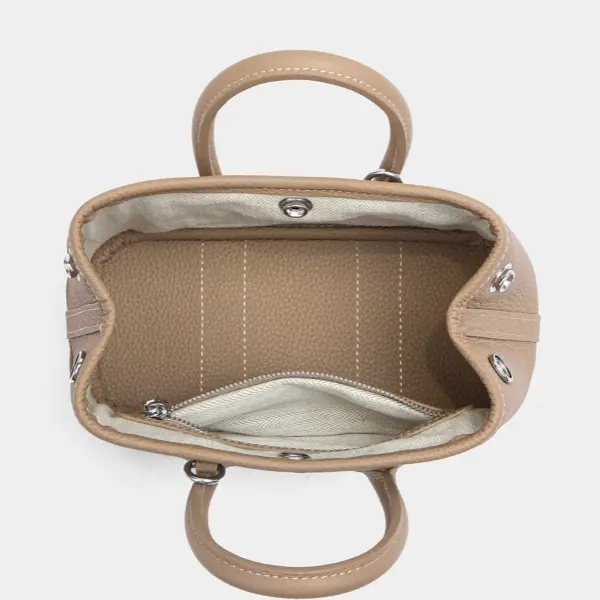 China New Women's Genuine Leather Handbag Summer Waterproof Buckle Luxury Casual Stylish Fashion Compact Open Shoulder Factory, Supplier
