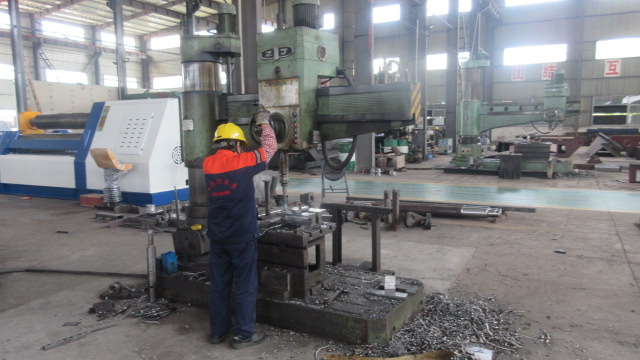 Precision drilling process in AcuTek CNC machine tool production facility