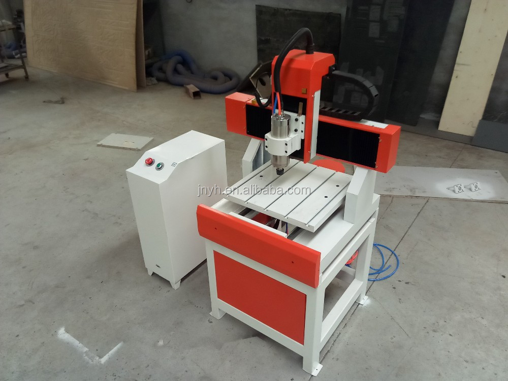 Mini Desktop 6090 CNC Router Machine DSP Control System Single 3D Capabilities Motor 2.2kW Water Cooling 24000rpm Gear Pump High