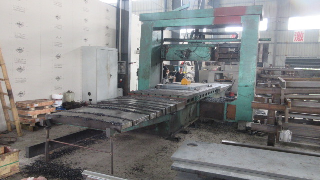 CNC milling machine quality inspection and precision testing at AcuTek factory