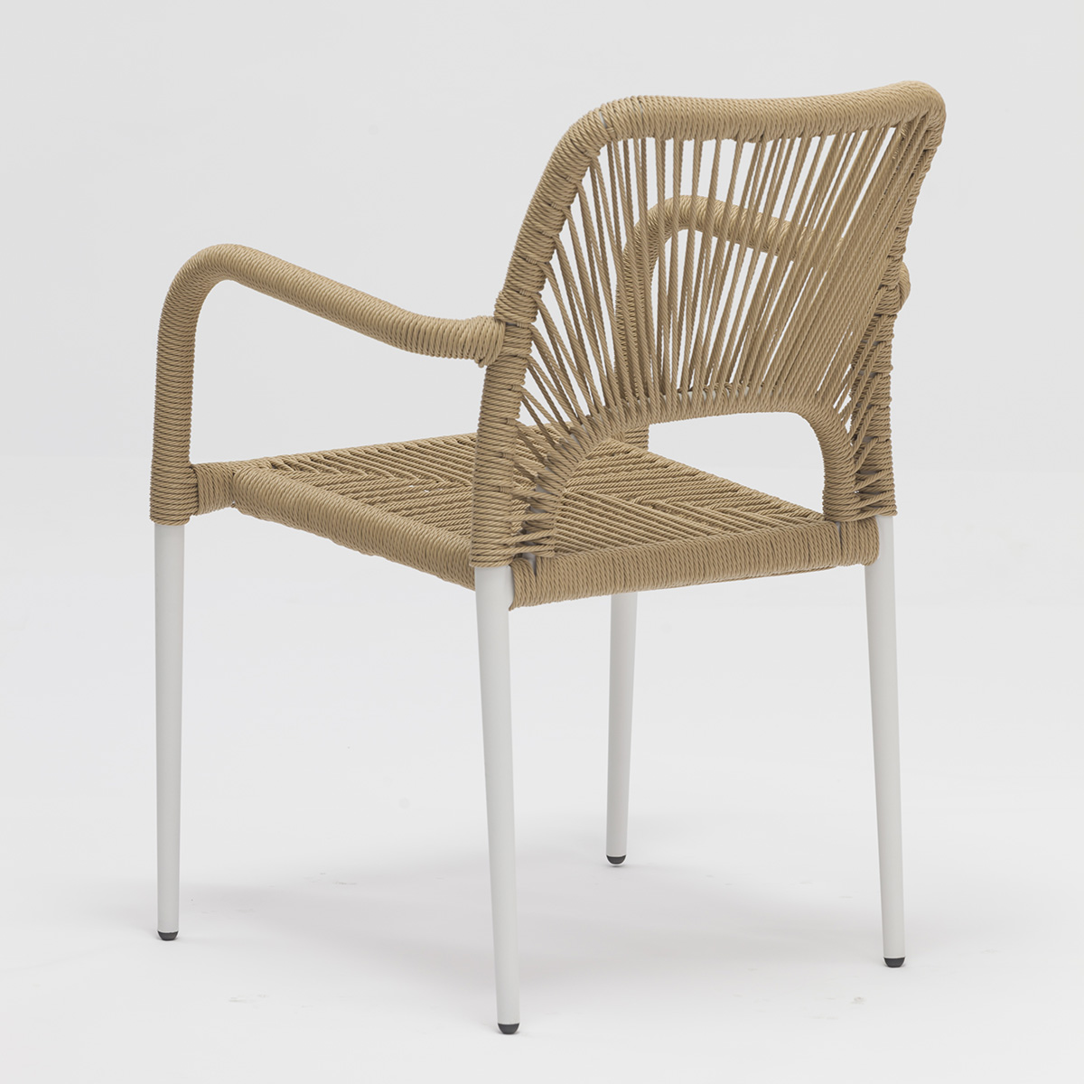 Outdoor dining setup with rattan chairs