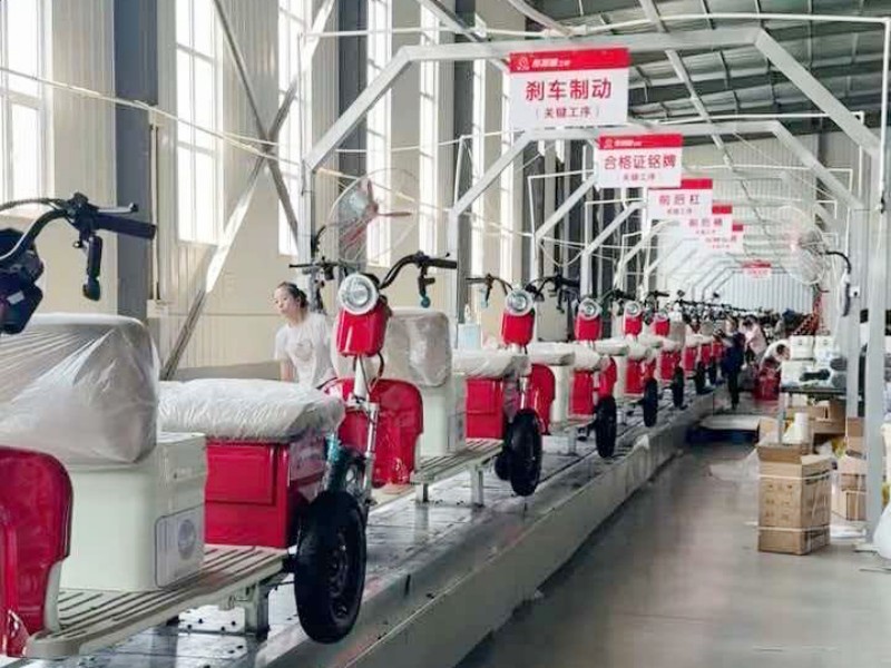 Step 3 - Electric vehicle assembly process at Aiweda manufacturing facility