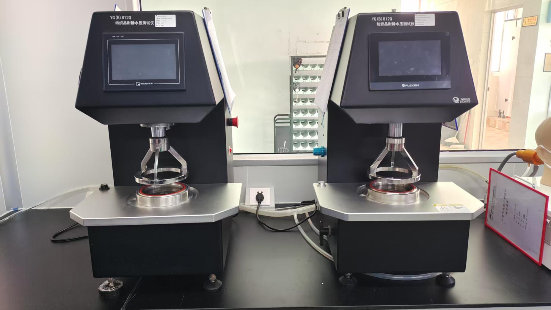 Textile hydrostatic pressure tester for protective fabric