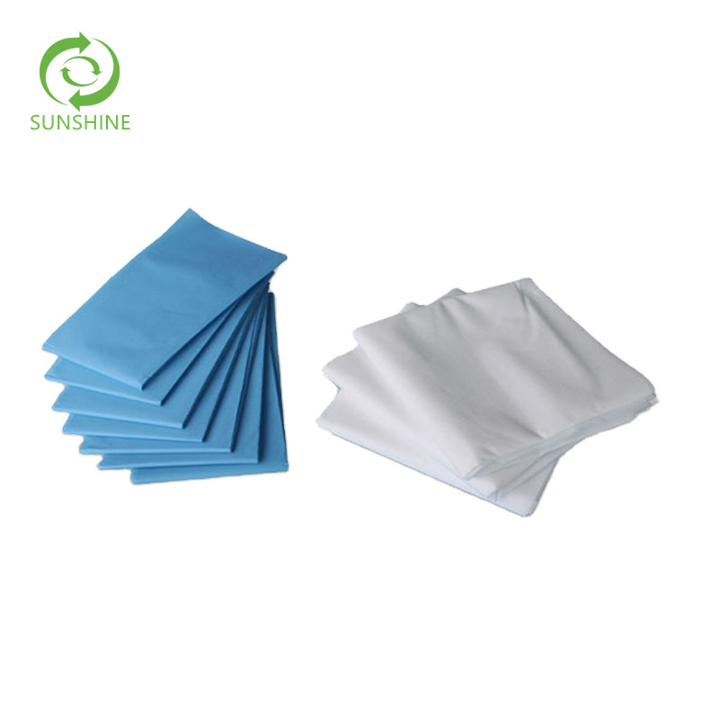 China Factory Wholesale PP Perforated Bed Rolls Nonwoven Bed Sheet Roll Disposable