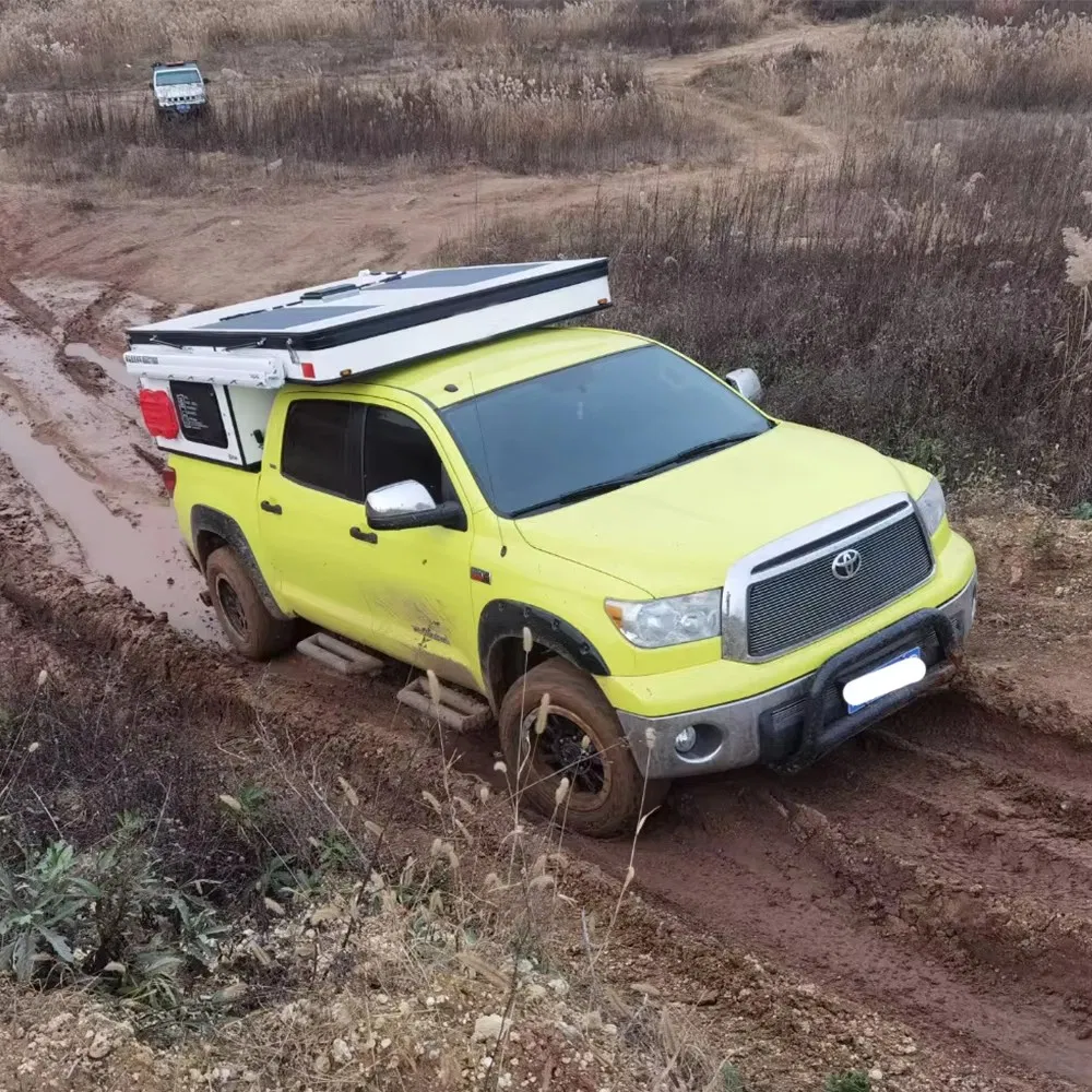 Adventure Ready Pop up Truck Camper Featuring Large Gear Storage and Rack Options