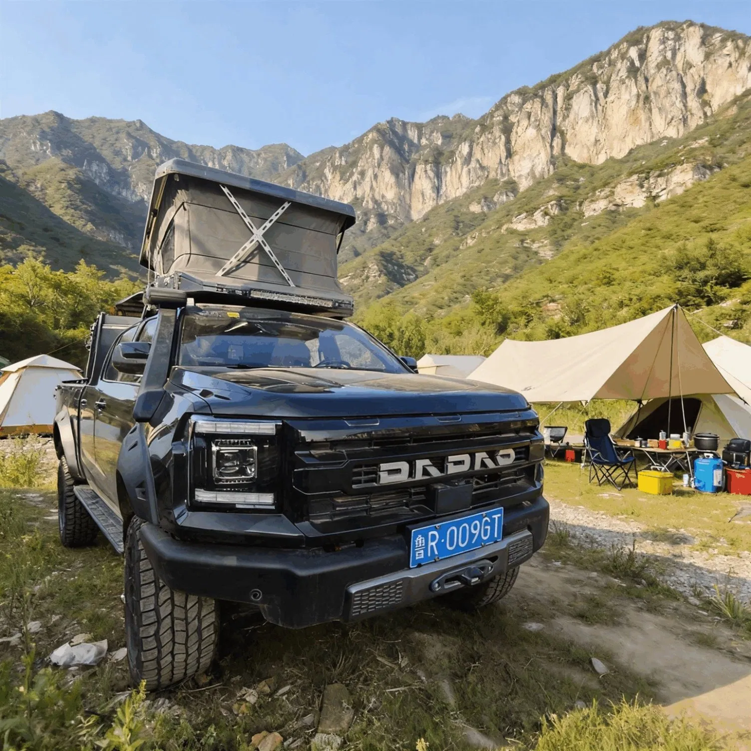 Adventure Ready Pop up Truck Camper Including Outdoor Shower Enclosure and Portable Toilet Compartment