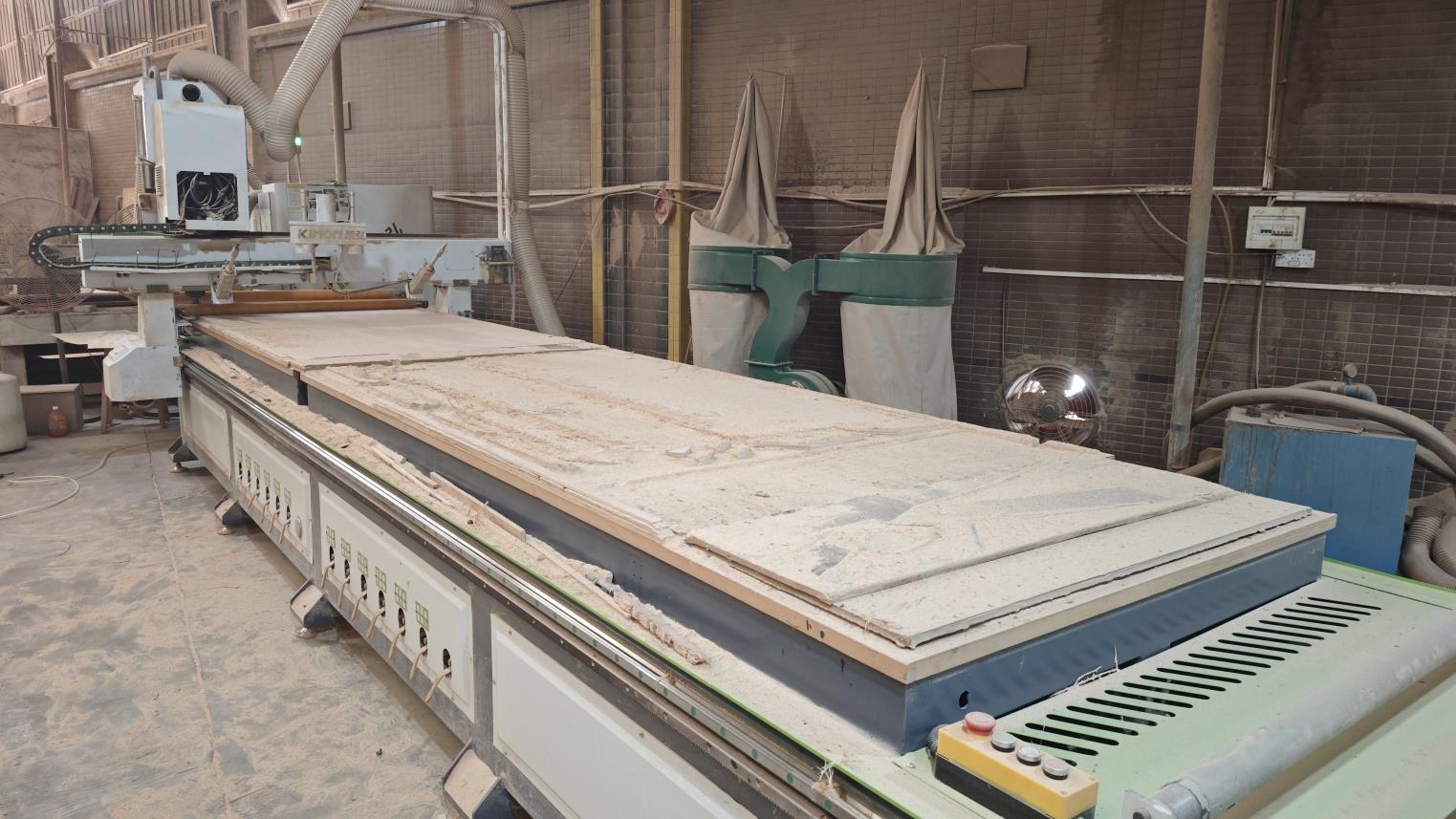 Wood cutting process at Ambrose Home furniture factory - precision lumber preparation