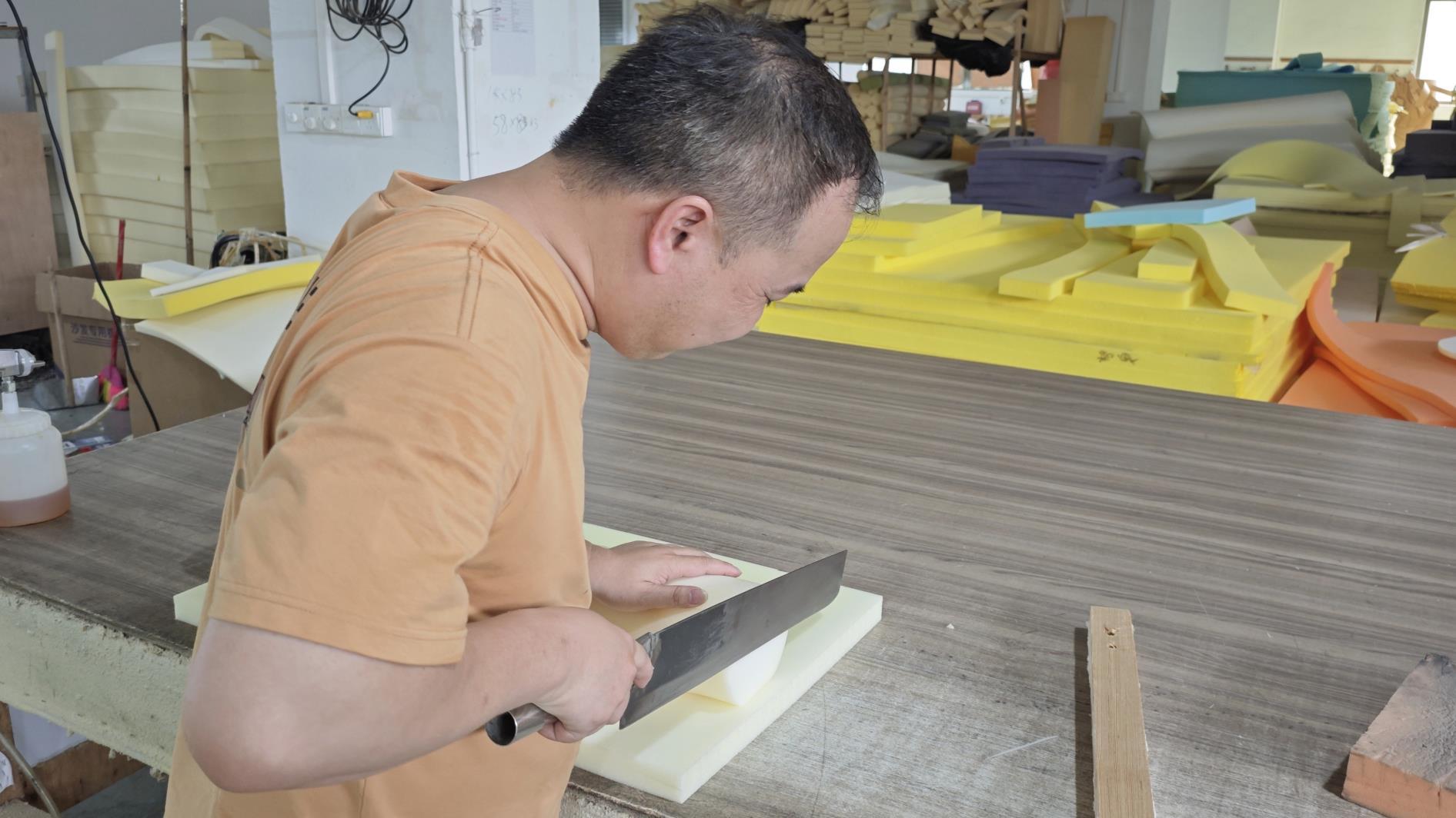 High-density sponge cutting for comfort layers in Ambrose Home upholstered furniture