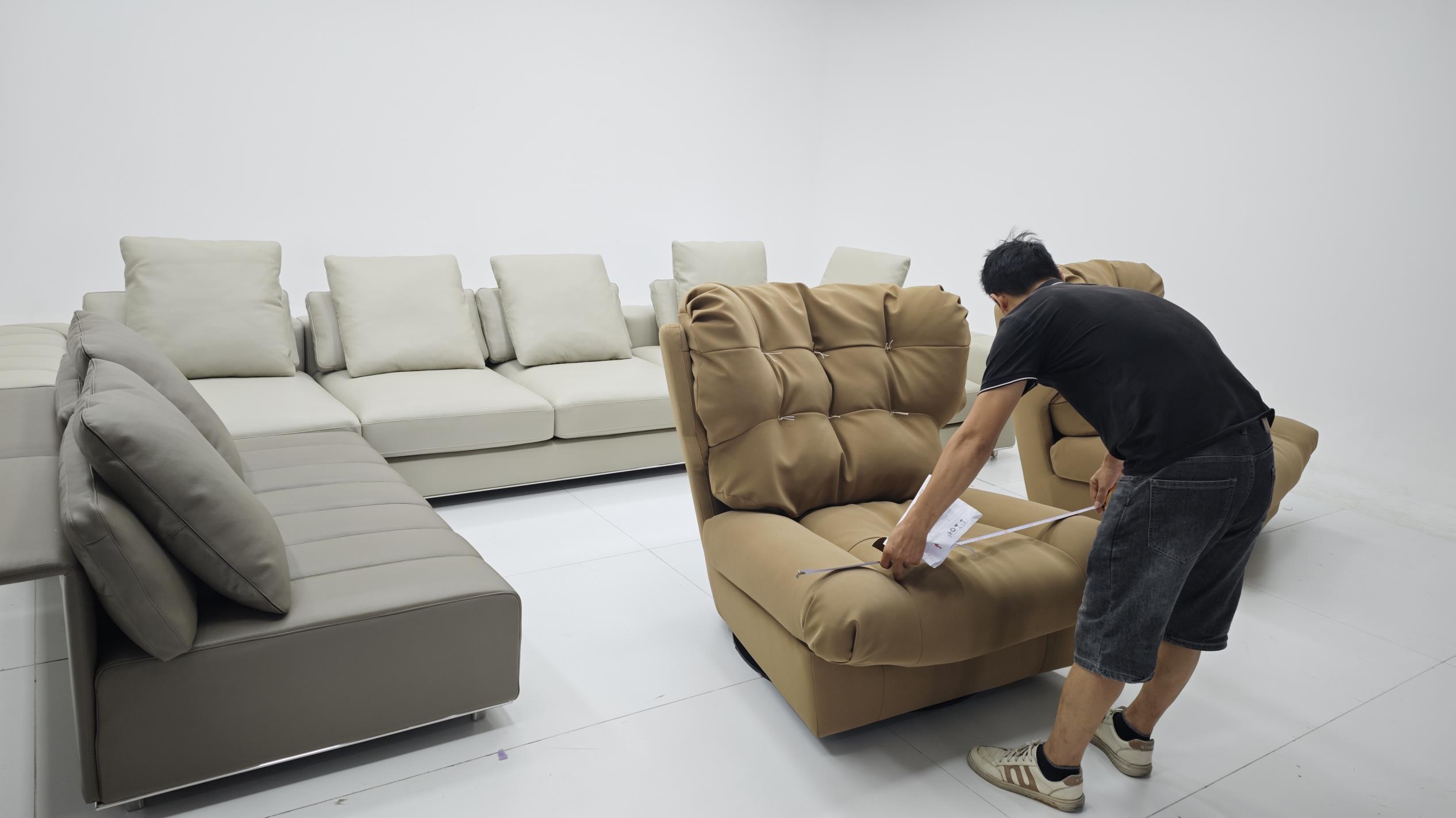 Quality control inspection of finished furniture products at Ambrose Home