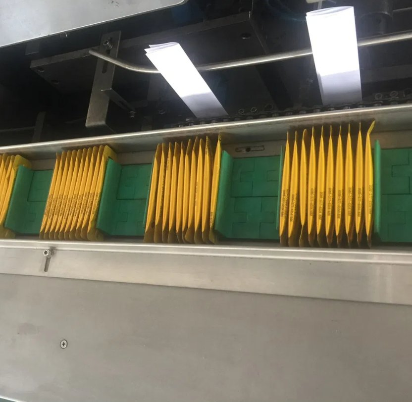 Línea de producción de empaquetado y cartoneo de sachets de polvo de clavo
