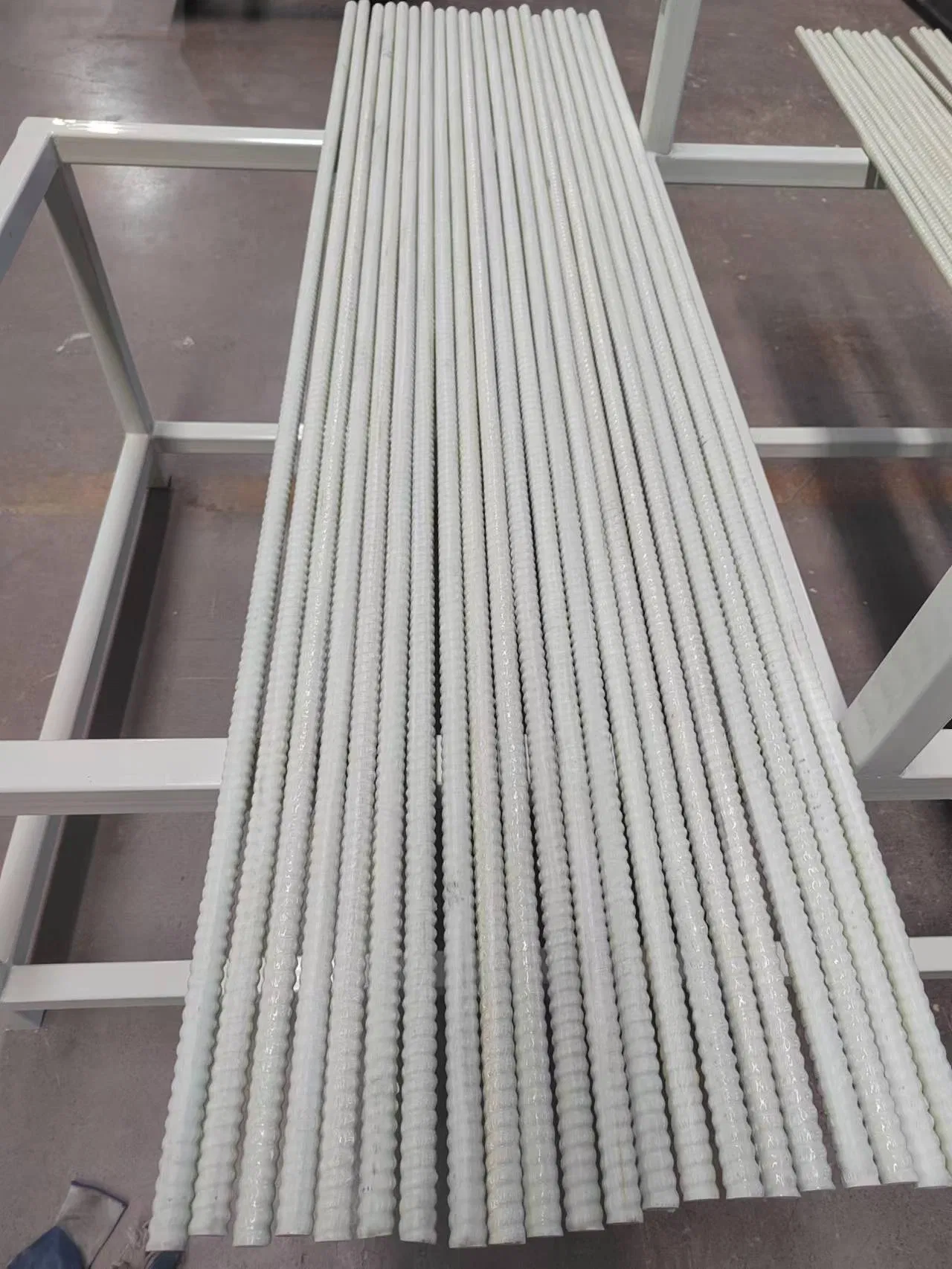 Advanced High-Temperature FRP Rebar Pultrusion Systems for Construction